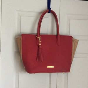 Joy and Iman red and tan leather tote bag